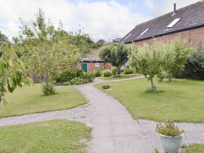 Attractive shared garden area | Wren Cottage, Salwayash, near Bridport