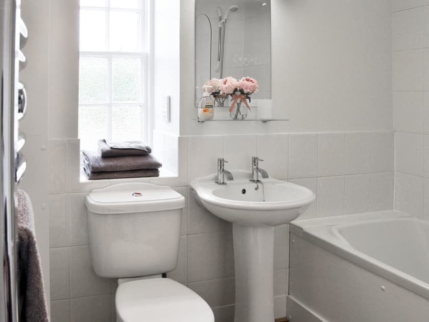 Bathroom with shower over bath | Brow Cottage - Glenkindie Estate Holiday Cottages, Glenkindie, near Alford
