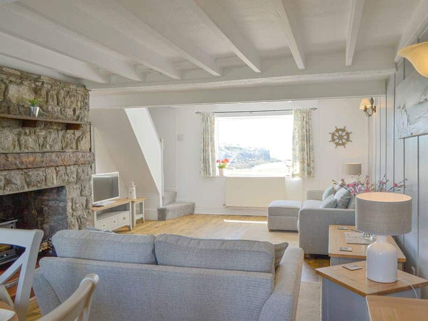 Exposed wood beams and amazing coastal views  | Bwthyn Y Borth, Rhoscolyn, near Holyhead