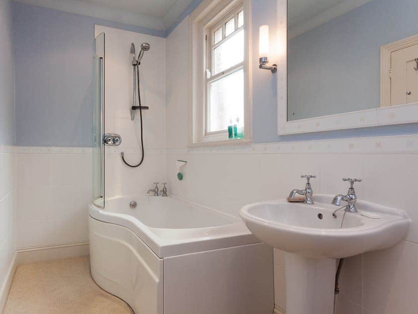 Spacious bathroom with shower over the bath | Mount Boone 12a, Dartmouth