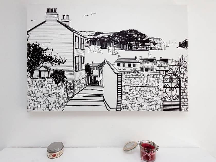 Unique wall art in the dining area | Evelyn Cottage, Dartmouth