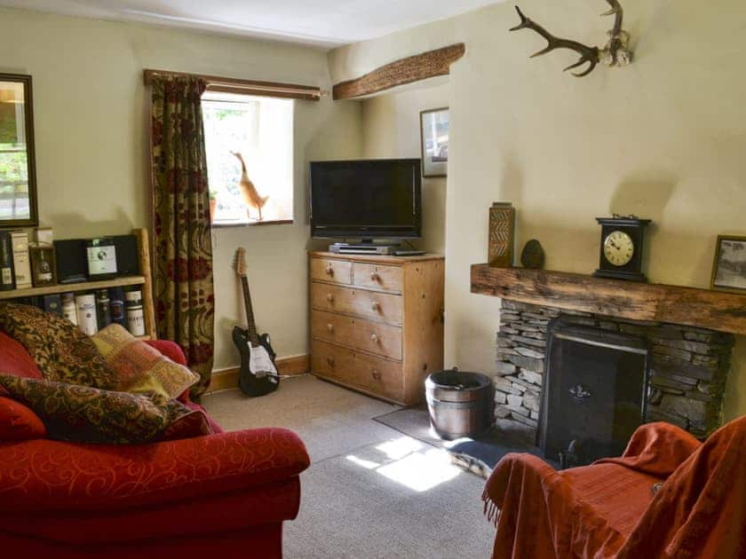 Cosy living room with  open fire | Old Mill Cottage, Duror, near Appin