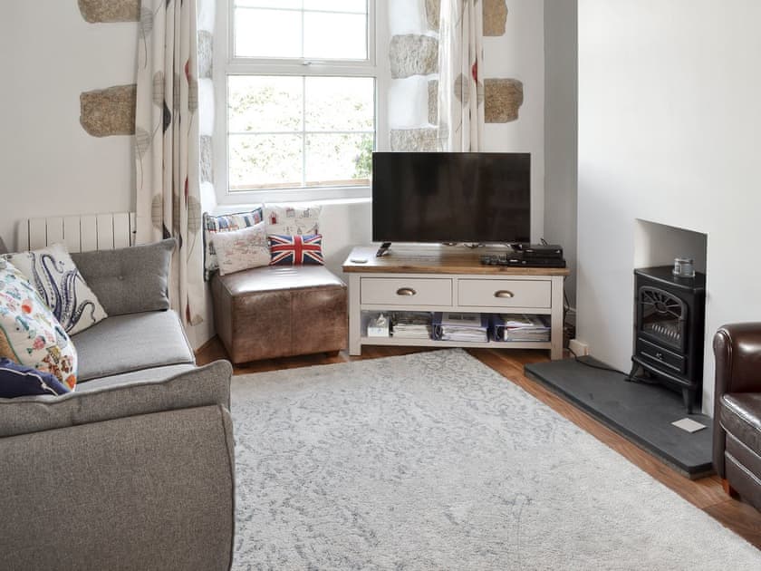 Relaxing lounge with Freesat TV | Morvoren (Sea Maiden) Cottage, The Lizard Village, near Helston