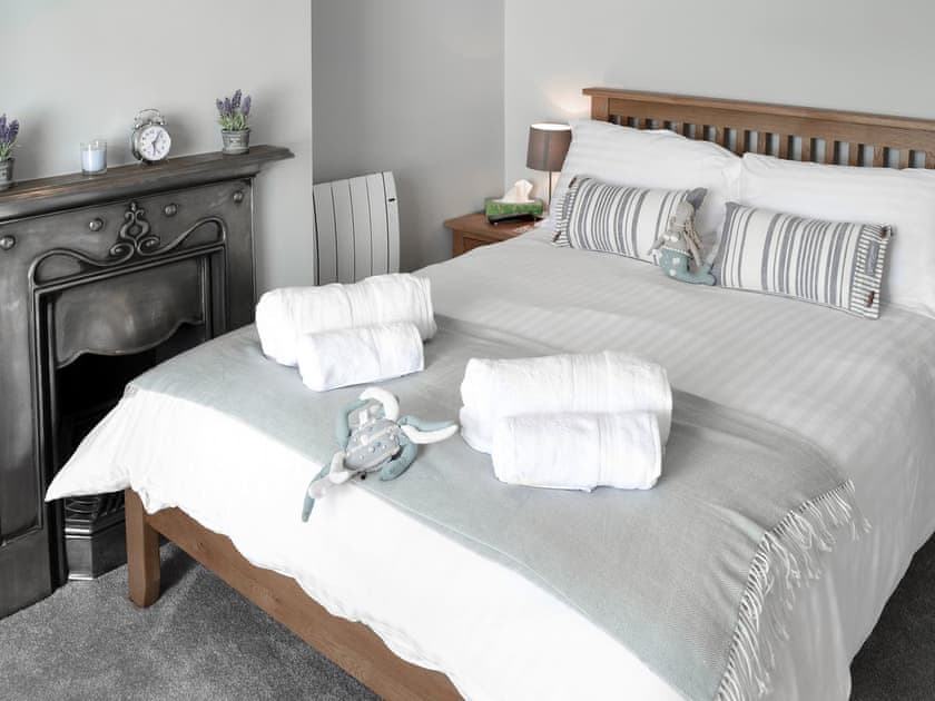 Elegantly decorated bedroom with double bed | Morvoren (Sea Maiden) Cottage, The Lizard Village, near Helston