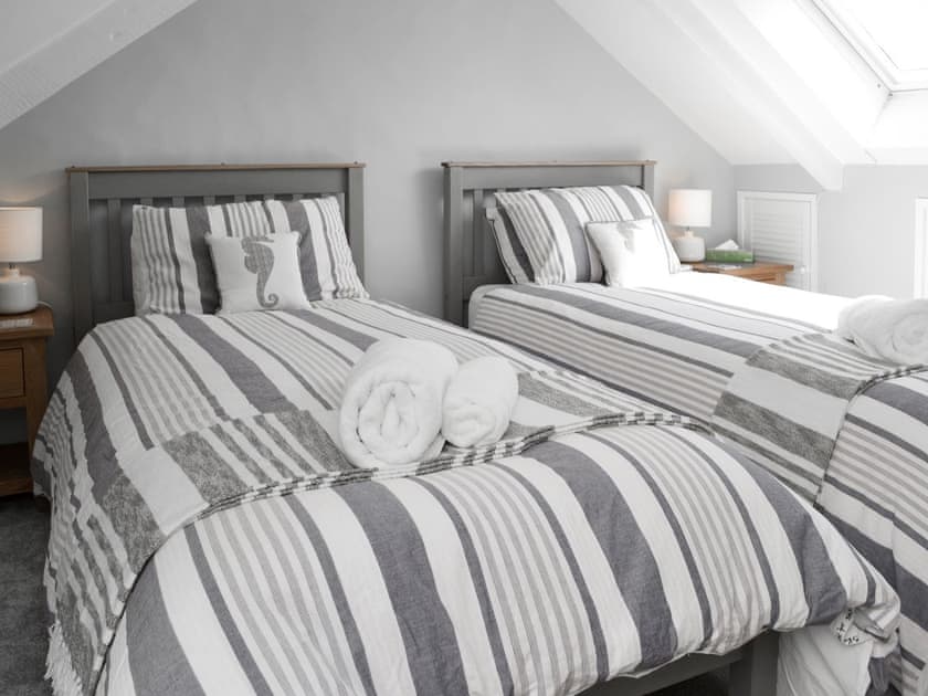 Calming bedroom with twin beds | Morvoren (Sea Maiden) Cottage, The Lizard Village, near Helston