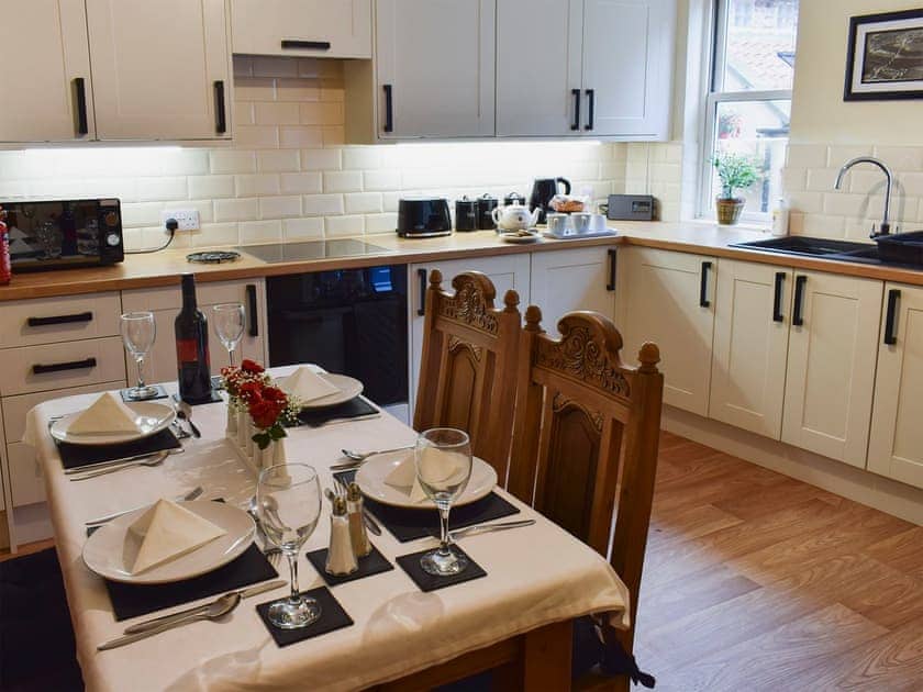 Well-equipped kitchen and dining area | Coachman’s House, Whitby