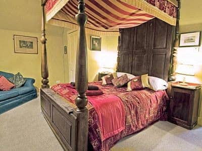 Four Poster bedroom | Lochside Stable House, Yetholm, nr. Kelso