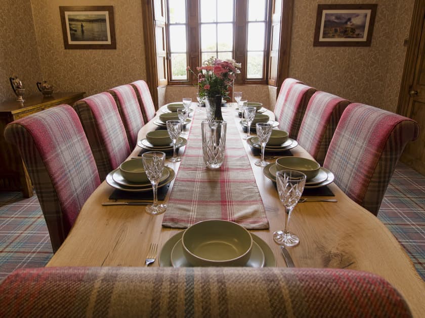 Elegant dining room with open fireplace | Drummuie House, Golspie