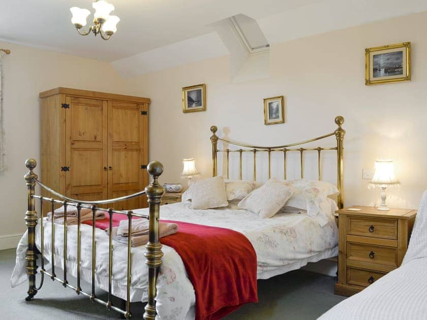 Relaxing family bedroom with a double and a single bed | White Hill Farm Cottage, Wonastow, near Monmouth