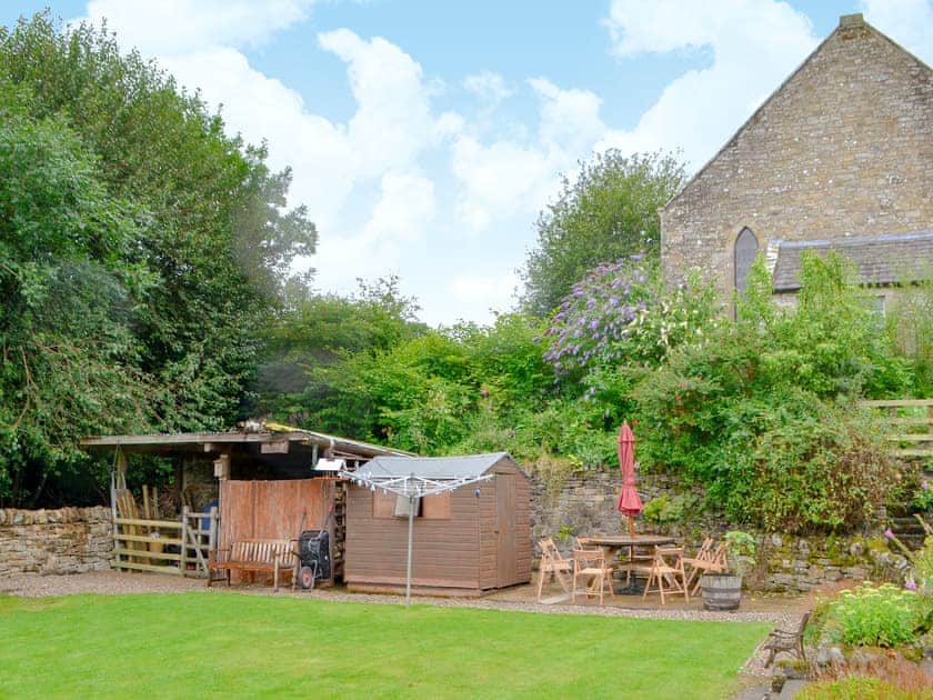 Attractive garden with seating area | Elm Croft, Falstone, near Bellingham