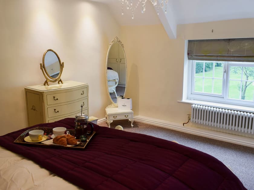 Bedroom with zip and link super kingsize bed  | Glebe Farm Cottage, Hornby
