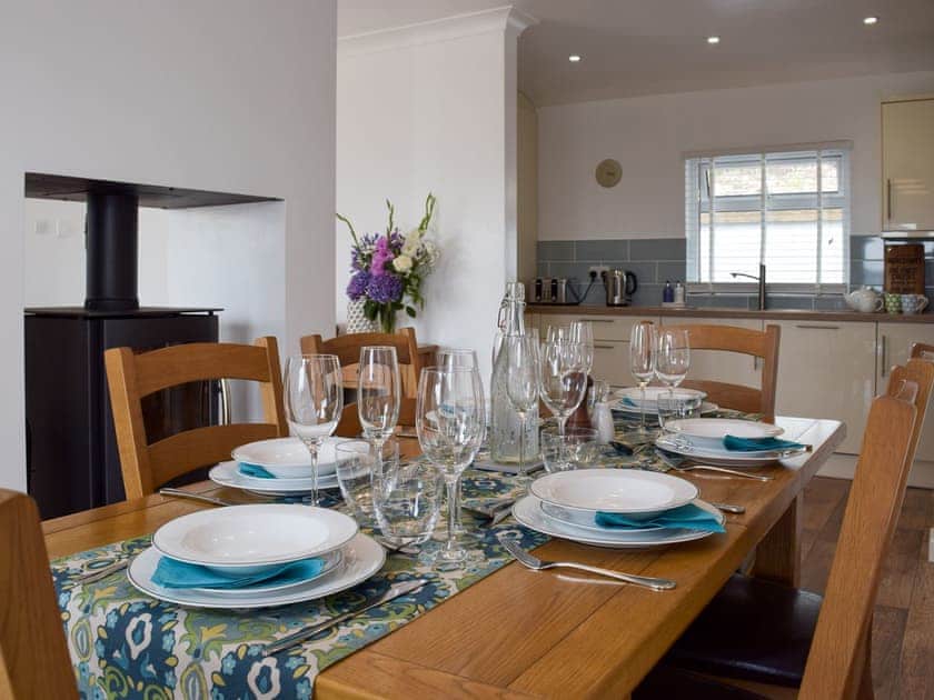 Open plan living space with wood burner | Caldey View, Near Stepaside, Saundersfoot