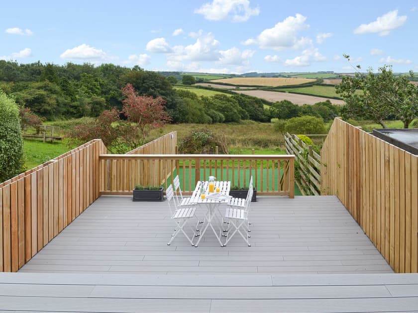 Sitting out area with stunning views | Poppy Cottage, Blackawton, near Dartmouth