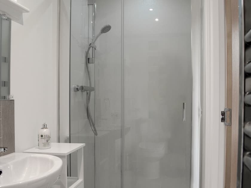 En-suite shower room with shower cubicle and heated towel rail  | Barn Owl Cottage, Newton, near Tain
