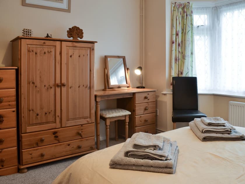 Double bedroom with additional bunk beds | Hideaway Cottage, Kingsgate, near Broadstairs