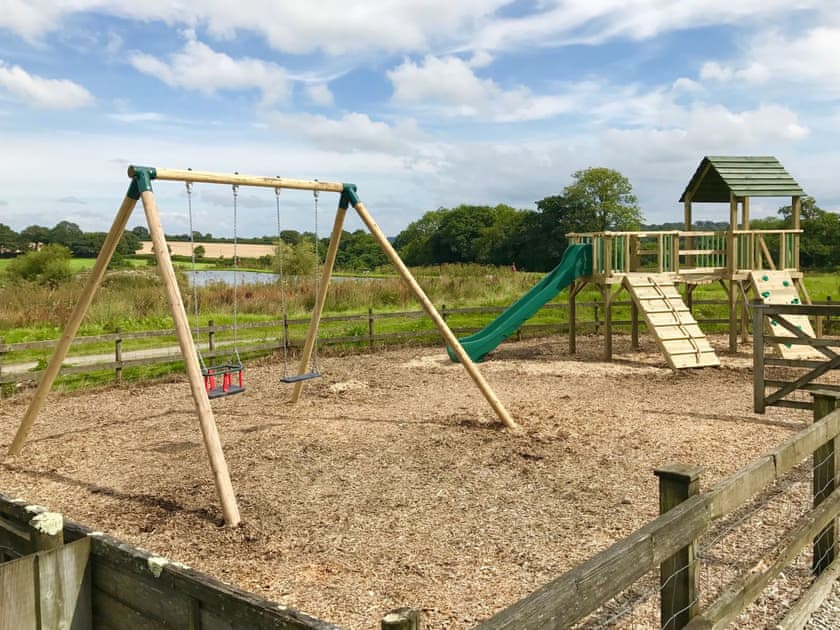Enclosed children’s play area | Toad Hall - Libbear Barton, Shebbear, near Bude