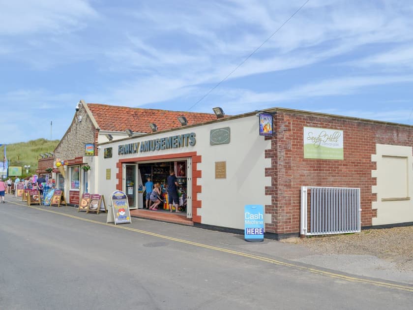Amusement centre at beach only 150yds from property | Primrose Cottage, Sea Palling.