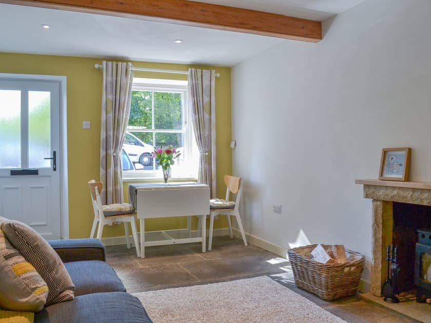 Beamed living area with woodburner | Clarence Cottage, Appleby-in-Westmorland