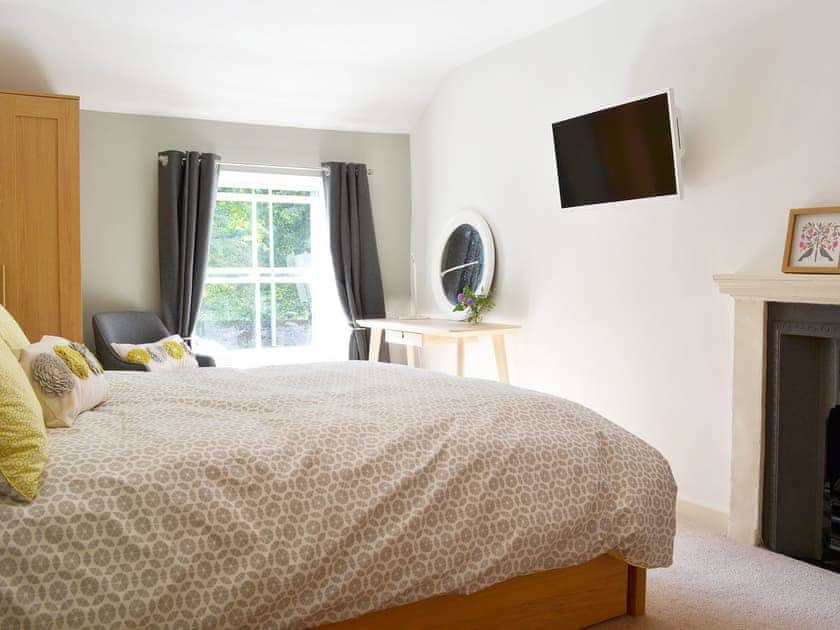 Warm and welcoming bedroom | Clarence Cottage, Appleby-in-Westmorland