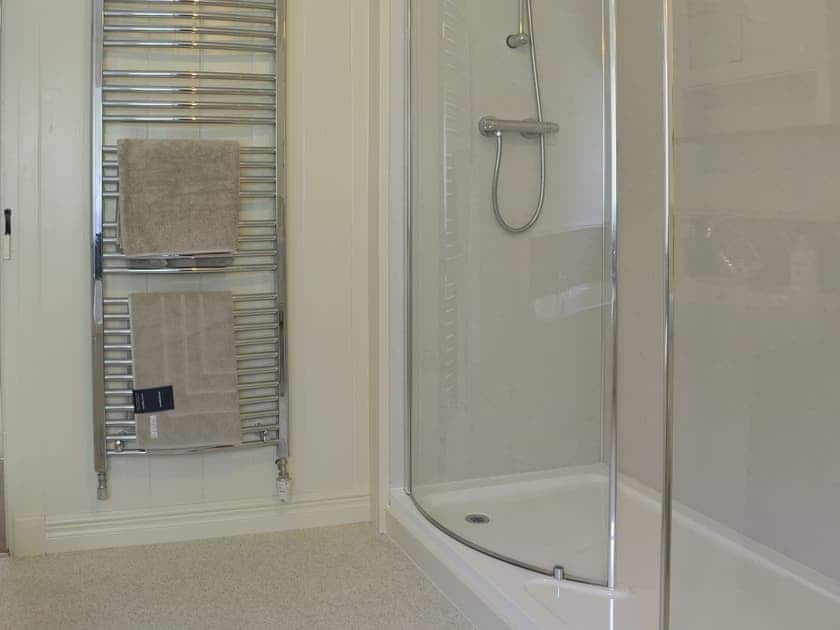 Bathroom with shower cubicle and heated towel rail | Clarence Cottage, Appleby-in-Westmorland