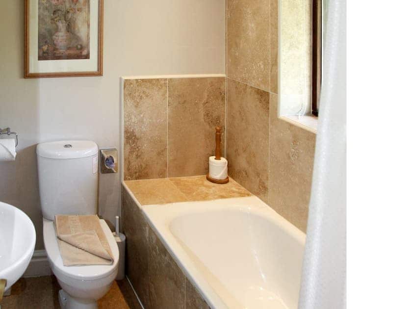 Bathroom with shower over bath and heated towel rail | Howe Top, Mungrisdale, near Keswick