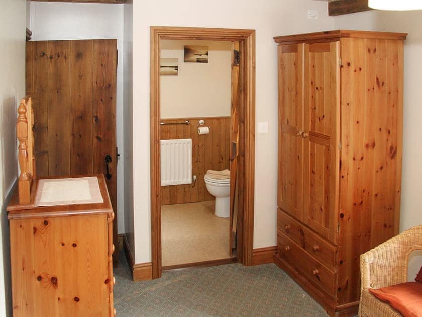 Tastefully furnished bedroom with en-suite | Saddleback Barn, Mungrisdale, near Keswick