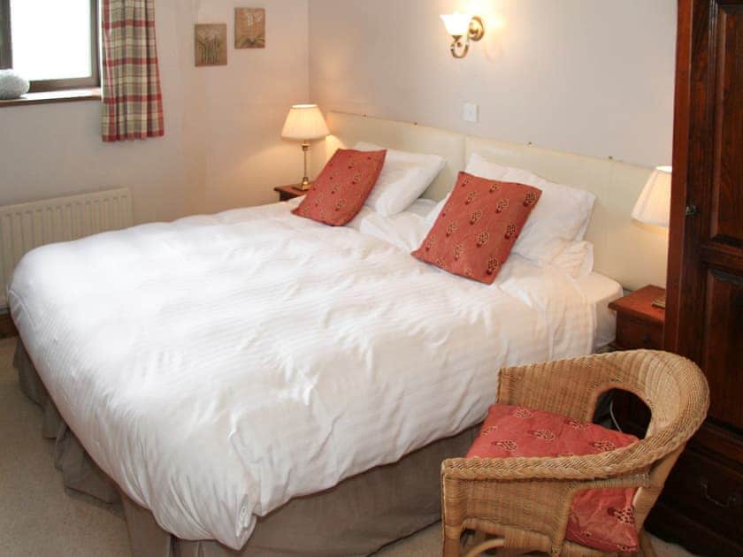 Elegant bedroom with zip and link super king-size bed | Saddleback Barn, Mungrisdale, near Keswick