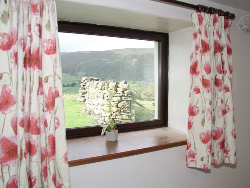 Stunning views from the bedroom | Saddleback Barn, Mungrisdale, near Keswick