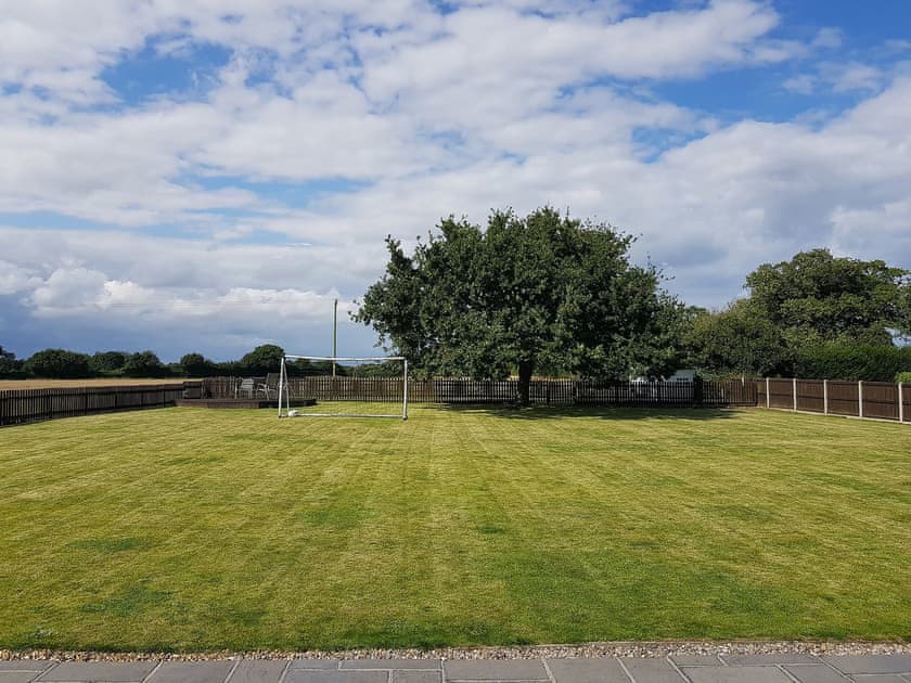 Lawned garden with sports facilities | Summer House Stables, Catfield, near Stalham