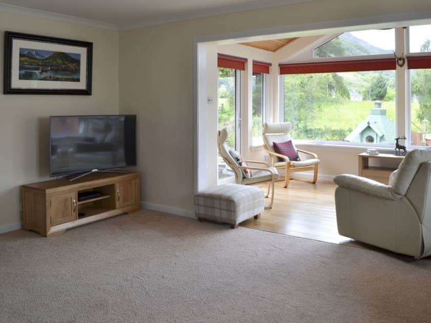 Relaxing lounge with Sky Smart TV | River Mill House, Ballachulish, near Fort William