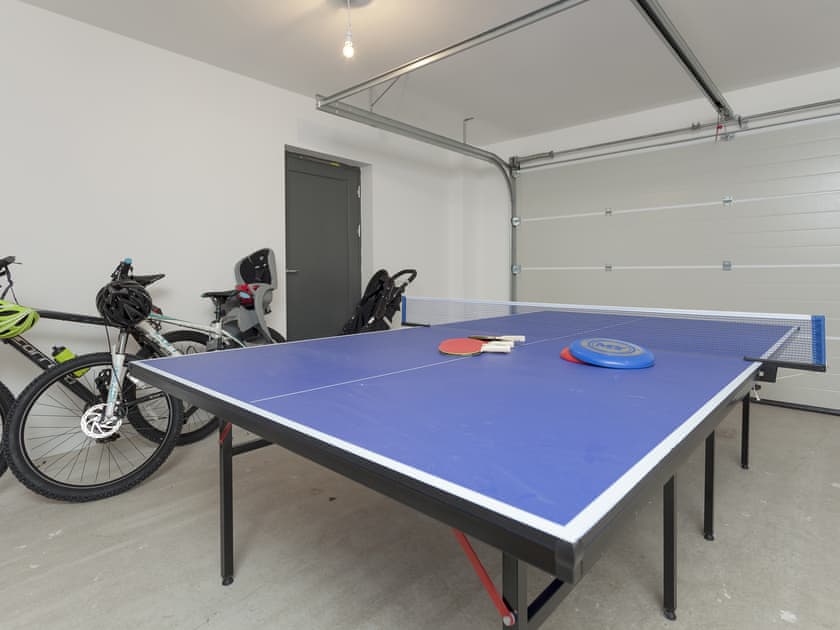 Useful recreation area within garage | Strathspey Lodge, Duthil, Carrbridge, near Aviemore