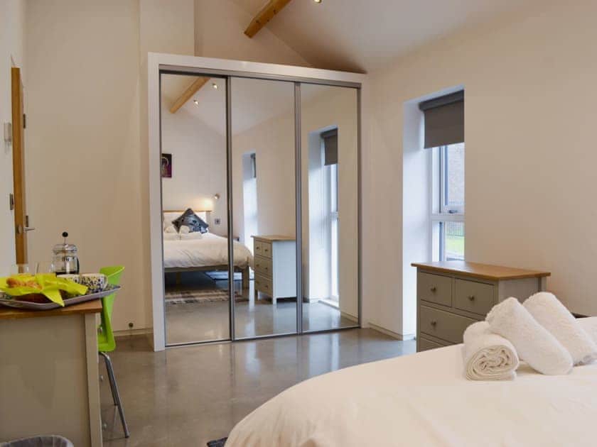 Relaxing bedroom with kingsize bed and en-suite | Bluebell Barn, Dunnington, near York