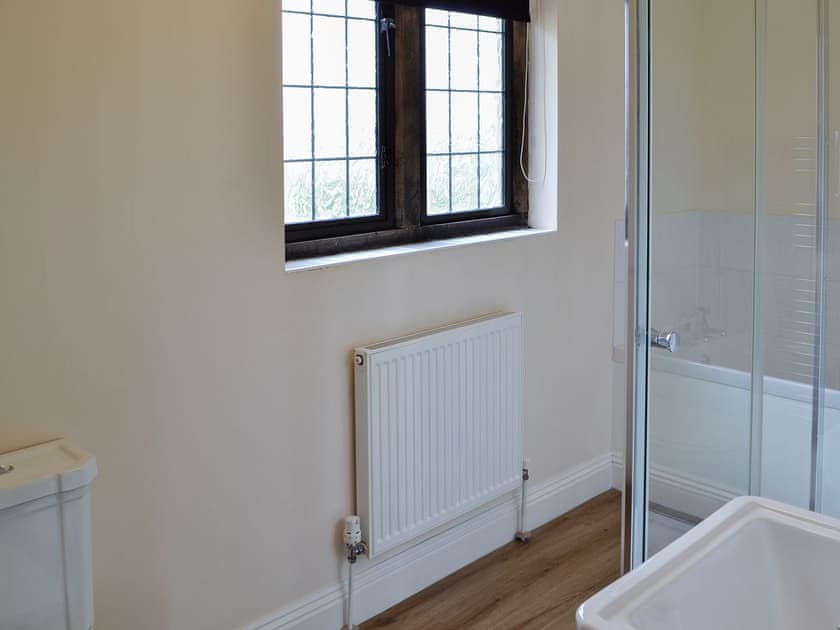 Bathroom with bath and shower cubicle | Canon Court Farmhouse, Milborne Port, near Sherborne