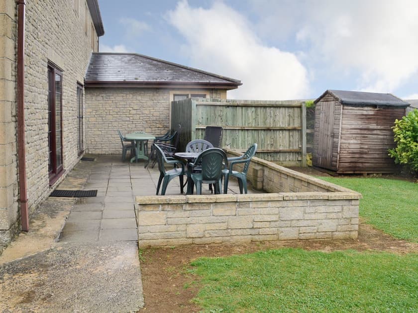 Sunny patio with views over the surrounding countryside | Canon Court Farmhouse, Milborne Port, near Sherborne