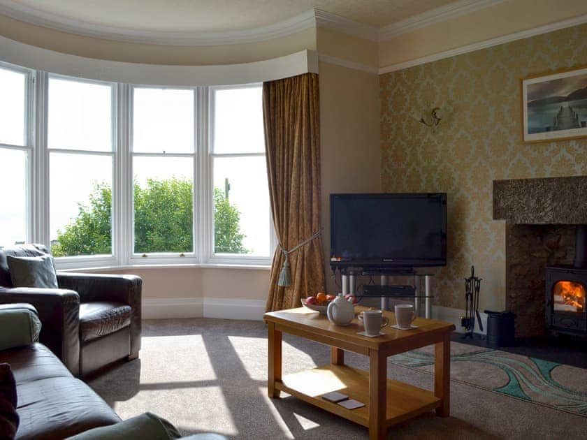 Comfortable lounge with 40” Freesat TV and wood burner | The Moorings, Grange-over-Sands