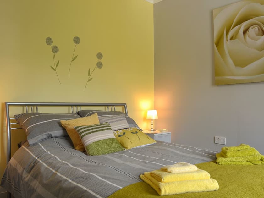 Tranquil bedroom with king-size bed | The Moorings, Grange-over-Sands