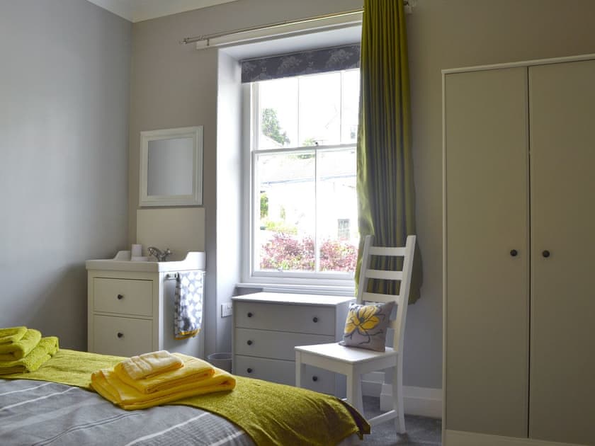 Tastefully furnished bedroom with king-size bed | The Moorings, Grange-over-Sands