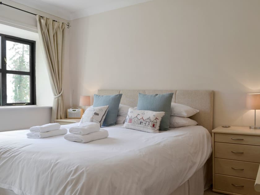 Tranquil bedroom with kingsize bed and views over the river | Four Seasons, Cowan Head, near Kendal