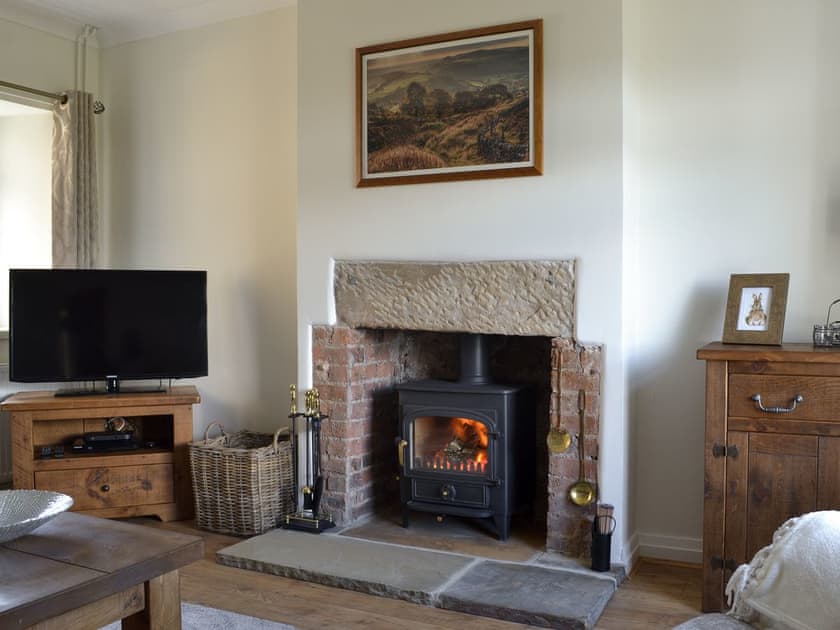 Living room with wood burner | Lings Farm Cottage, Temple Normanton, near Chesterfield
