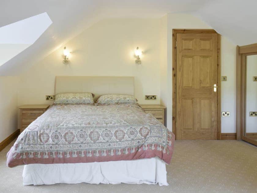 Comfortable double bed within family bedroom | No 1 Pengraig Draw - Pengraig Cottages, Near Llanfarian