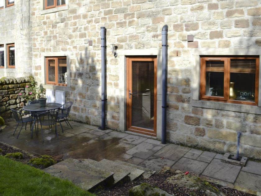 Delightful patio area | Mia Cottage - Buckley Green Bottom Farm, Buckley Green, near Haworth