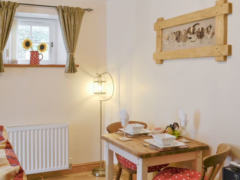 Convenient dining area | Skelmorlie Cottage, Portinscale, near Keswick