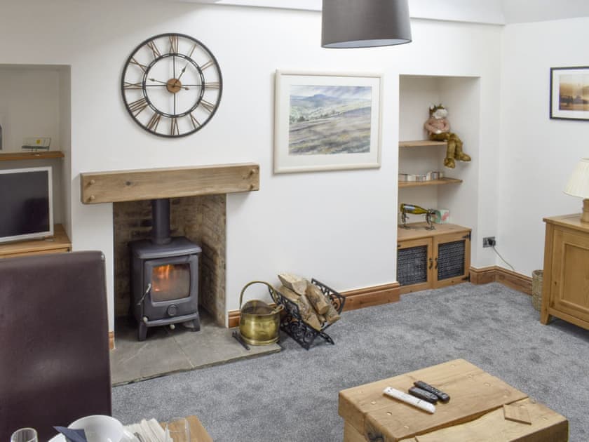 Characterful living area with wood burner | Upside Down Cottage, Richmond