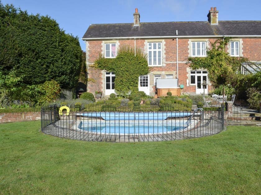 Rear lawned garden and swimming pool | Downwood Vineyard, Blandford