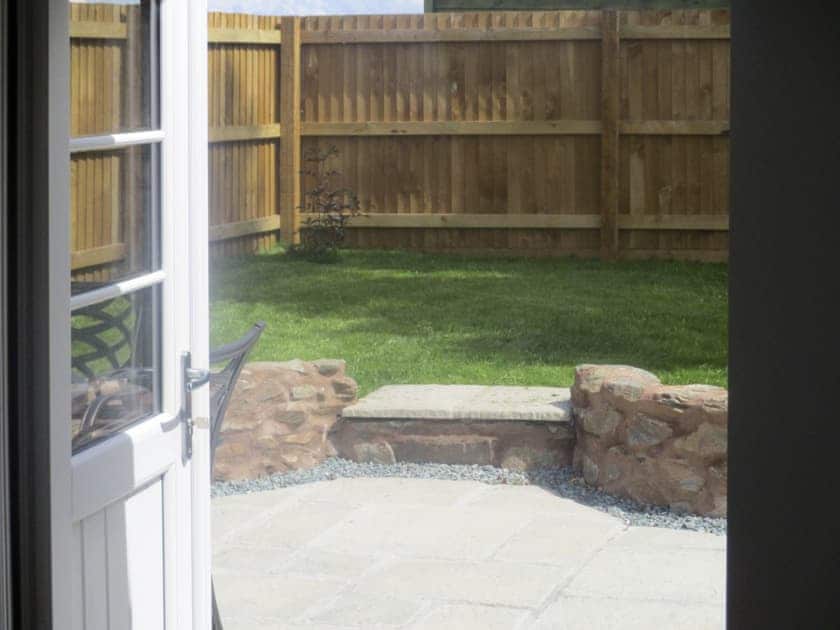 Door from double bedroom leading to the garden | Bluebell Cottage, Over Stowey, near Taunton