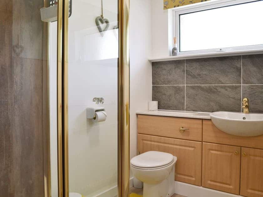 Shower room with shower cubicle and toilet | Burns Knott, Keswick