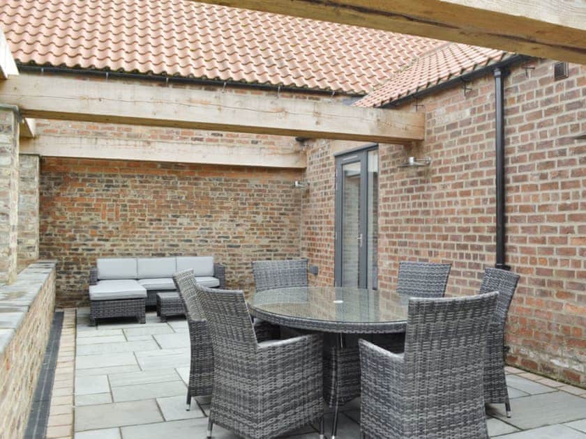 High quality outdoor furniture on paved patio | Bluebell Barn, Dunnington, near York