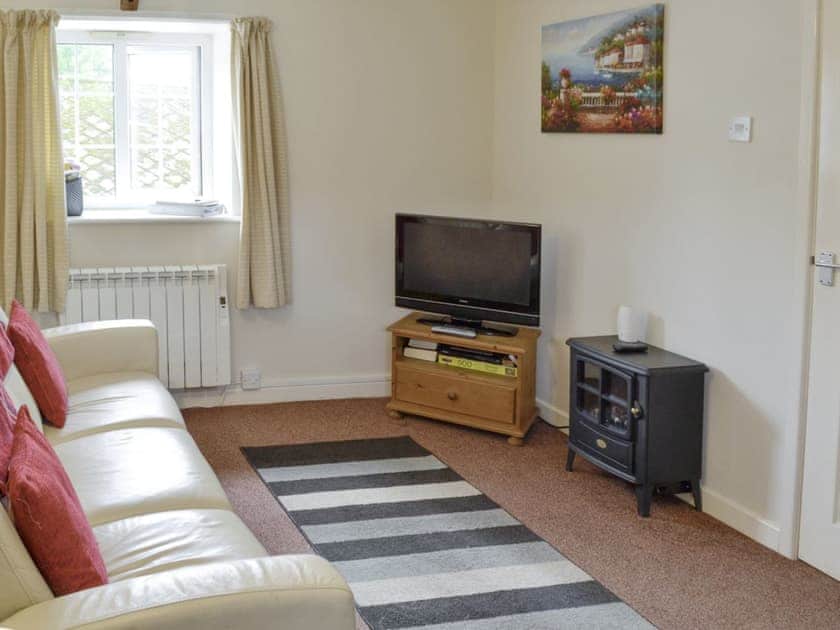 Cosy seating area | Foxglove Cottage - Dairy Farm Cottages, Wootton Fitzpaine, near Charmouth