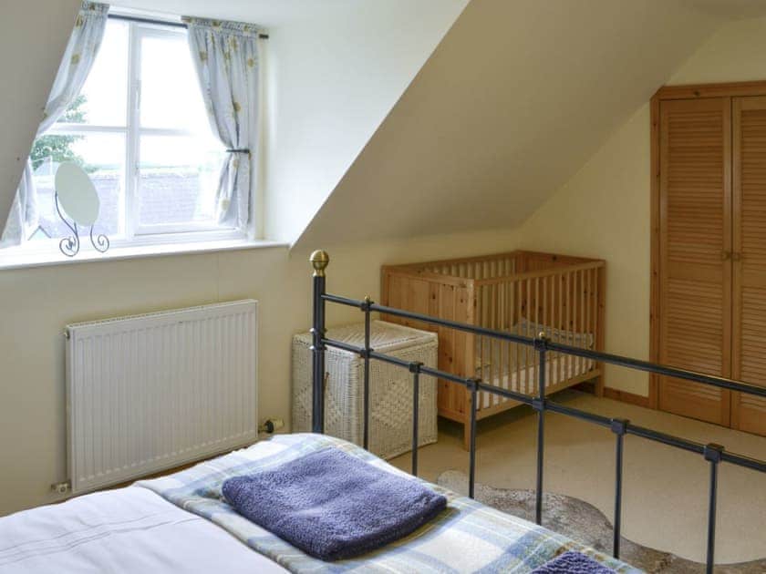 Second double bedroom with cot | Hume Orchard Steading, Hume, near Kelso