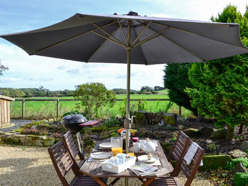 Outdoor dining area | Broomhouse Lodge, Edrom, near Duns